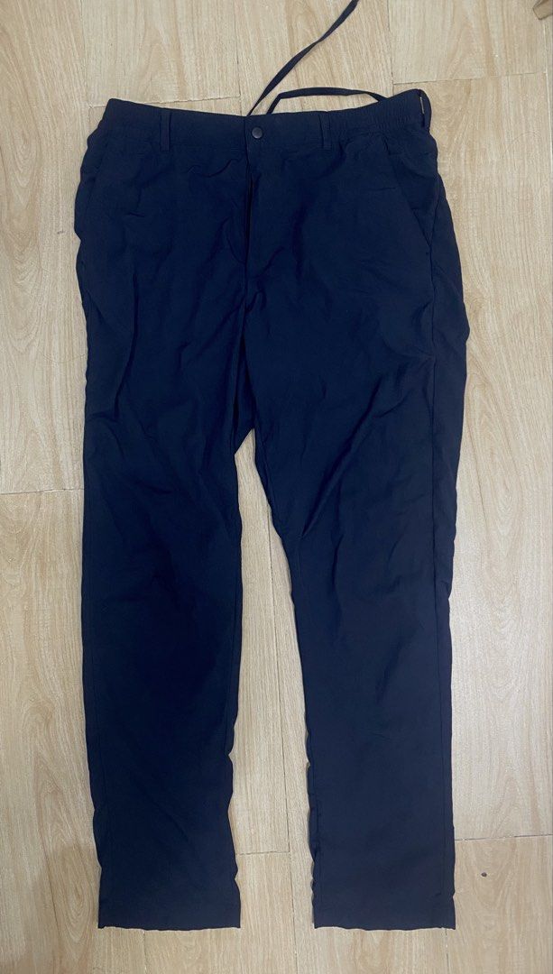 UNIQLO PANTS GEARED like / 2 WAY STRETCHED (Category: Trousers) located in Baguio. Submitted by dmnddnmd (Listing ID 1471184932, Image 1). Description: - Brand: Uniqlo - Color: Navy Blue - Size: L (Fits waist 84-92cm) / Size 32-34 - Material: 90% nylon, 10% spandex with mesh pocket lining - Features: Drawstring and button closure, straight leg fit - Condition: Clean and ready to wear - Note: Please refer to pictures for exact length and width mea