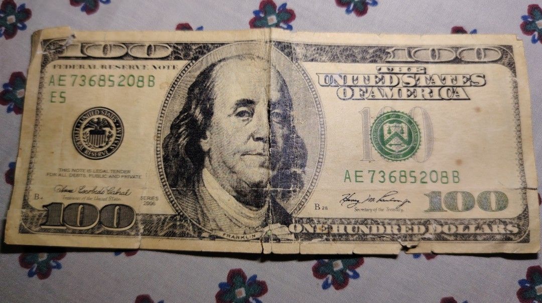 US 100 Dollar Bill Series 2006 (Category: Currency) located in Manila. Submitted by vastearth_3748fa (Listing ID 1471166151, Image 1). Description: - Genuine US 100 Dollar banknote (Series 2006) - Features Benjamin Franklin (front) and Independence Hall (back) - Serial Number: AE 73685208 B - Condition: Real deal with visible center creases and worn edges - Perfect for collectors or currency exchange bilhin nyo na kahit 1k nalang 09683710127 pm m