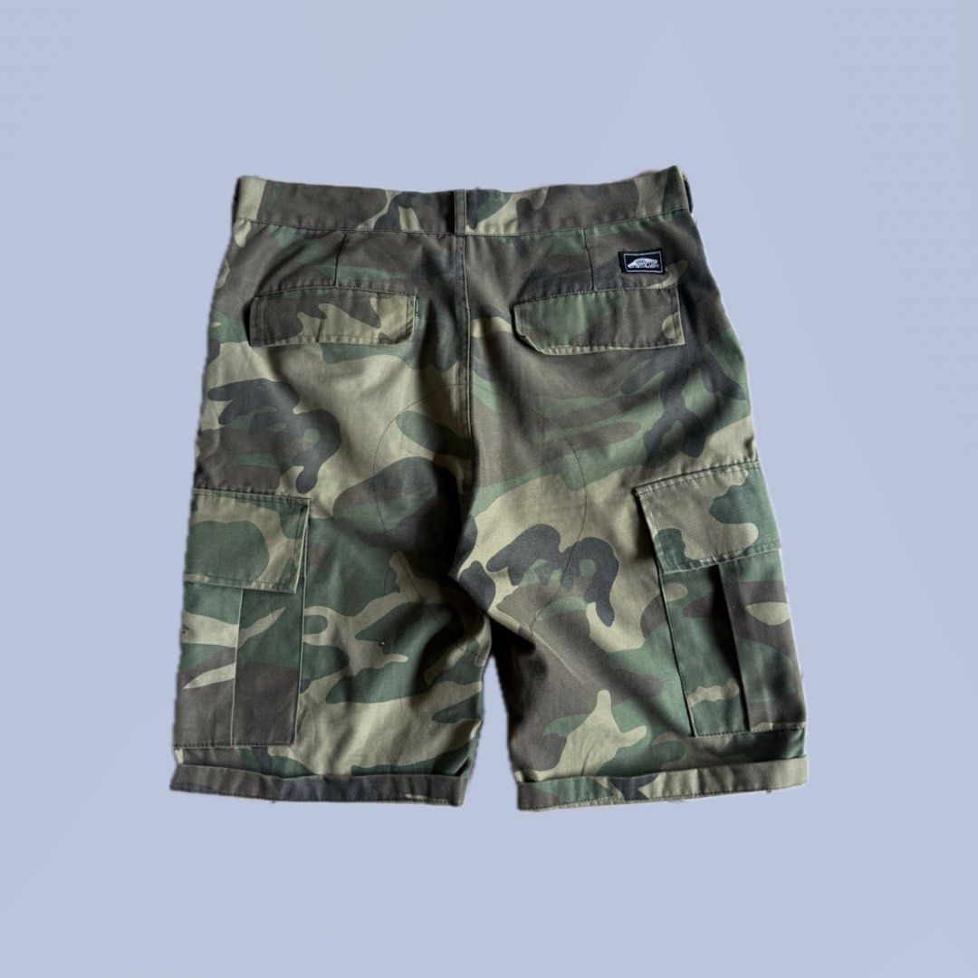 Vans Camo Cargo Shorts (Category: Shorts) located in Benito Soliven. Submitted by markedasdifferent (Listing ID 1471131509, Image 2). Description: CR-7/10 LOOOKS VINTAGE COLORWAY GOODFADE CONDI: 8/10 SIGN OF USE 1 PINHOLE 32W 22L 10.5H.