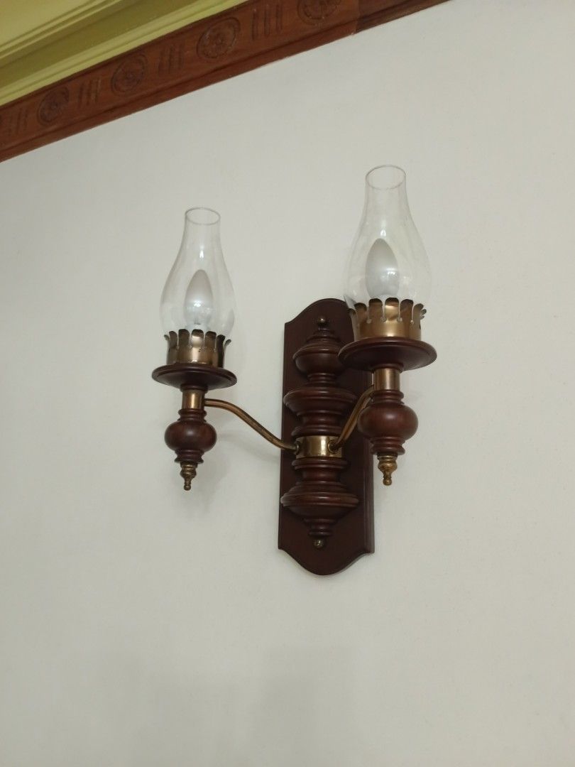 Vintage 2 Light Wall Lamp/Scones (Category: Lighting) located in Manila. Submitted by gieboy65 (Listing ID 1471227506, Image 1). Description: Made of Mixed Brass and Wooden Materials Brown Crackled Finished 2 Lights 🕯️ E14 Bulb Excellent Vintage Shape and Lighting Condition See Photos for References location Brgy Rizal Makati/Taguig MOP Gcash or Cash upon pick up.