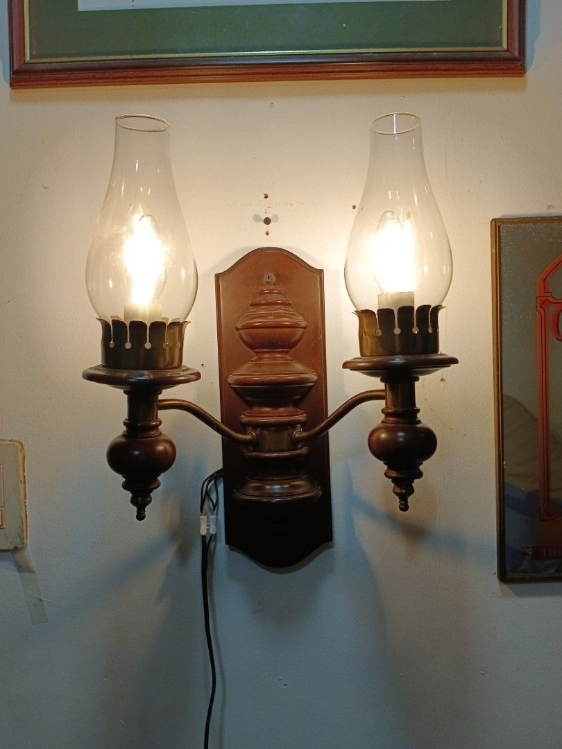Vintage 2 Light Wall Lamp/Scones (Category: Lighting) located in Manila. Submitted by gieboy65 (Listing ID 1471227506, Image 3). Description: Made of Mixed Brass and Wooden Materials Brown Crackled Finished 2 Lights 🕯️ E14 Bulb Excellent Vintage Shape and Lighting Condition See Photos for References location Brgy Rizal Makati/Taguig MOP Gcash or Cash upon pick up.