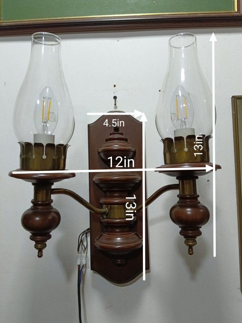 Vintage 2 Light Wall Lamp/Scones (Category: Lighting) located in Manila. Submitted by gieboy65 (Listing ID 1471227506, Image 2). Description: Made of Mixed Brass and Wooden Materials Brown Crackled Finished 2 Lights 🕯️ E14 Bulb Excellent Vintage Shape and Lighting Condition See Photos for References location Brgy Rizal Makati/Taguig MOP Gcash or Cash upon pick up.