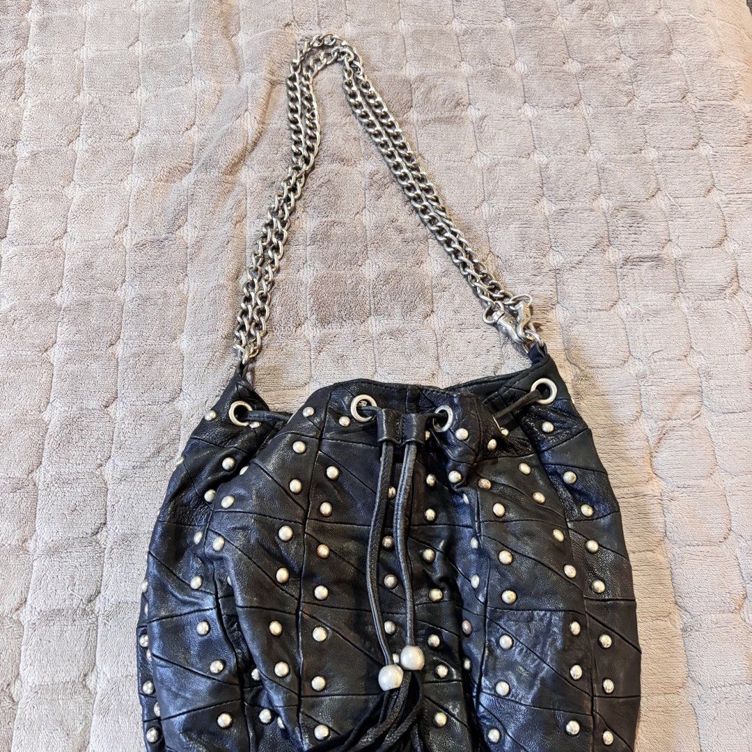 Vintage Full Studded Bucket Bag (Category: Shoulder Bags) located in Imus. Submitted by wear.arca (Listing ID 1471143487, Image 2). Description: Flaws: Some tarnishing on studs No tarnishing on chain strap Can fit a lot No flaws on body.