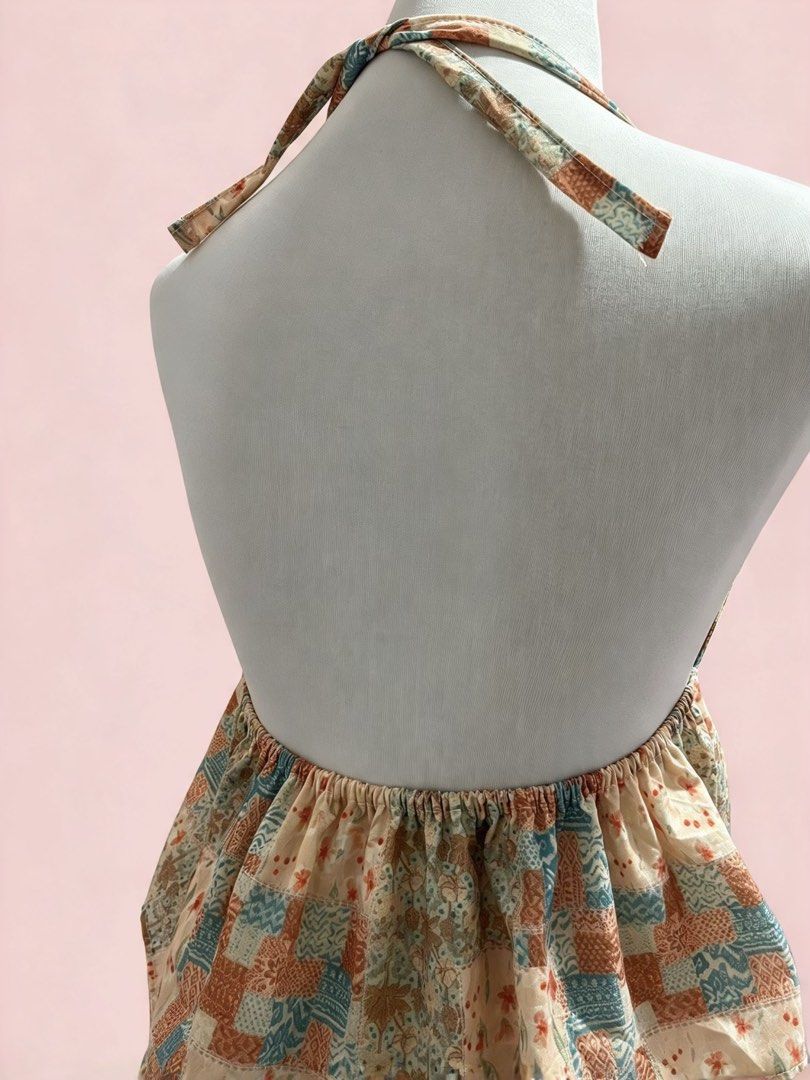 Vintage Patchwork Halter Top with Lace Trim (Category: Sleeveless) located in Koronadal. Submitted by ciara_12 (Listing ID 1471271021, Image 3). Description: Chic cream halter top featuring a low V-neck with white lace trim, an open back, and a flowy peach, teal, and brown patchwork hem. Soft, comfortable, and ties at the neck..
