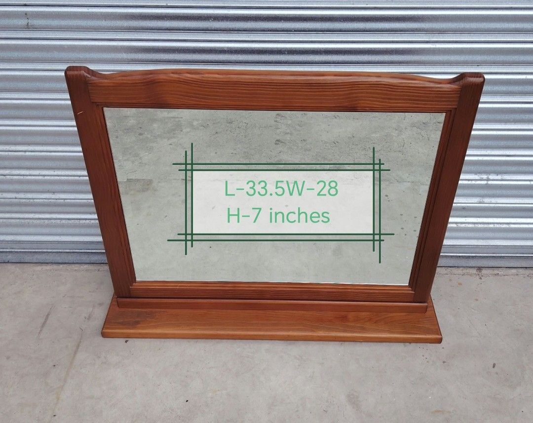 Vintage table top mirror (Category: Office Furniture & Fixtures) located in Taguig. Submitted by sydney08.owl (Listing ID 1471234801, Image 1). Description: -Frame is made of WOOD -Commonly used as part of a dressing table, chest of drawers, or vanity setup. -Diagonal framed glass -Curved metal support stay and hinge arm that allows the mirror or panel to tilt or fold. -Minimal scratches..