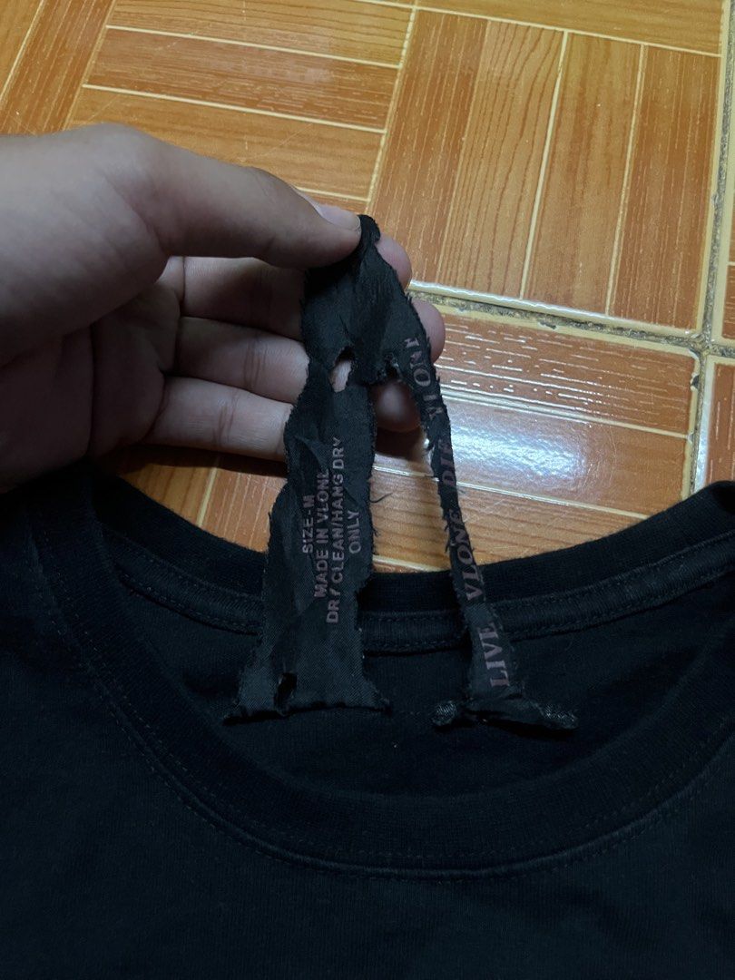 Vlone Blue Logo T-shirt (Category: Tshirts & Polo Shirts ) located in Manila. Submitted by jlfamiliar69452 (Listing ID 1471146809, Image 3). Description: - Brand: Vlone - Color: Dark Navy Blue with light blue lettering - Size: Medium (M) - Design: Classic front print and signature large V graphic on the back - Authenticity: Includes interior Vlone neck tag and wash tag with holographic security sticker - Material: Clean, comfortable cotton - Cond