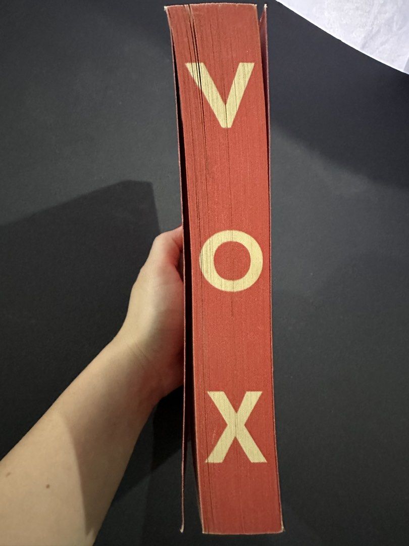 VOX by Christina Dalcher Novel Paperback (Category: Storybooks) located in Botolan. Submitted by novelfindsph (Listing ID 1471156856, Image 3). Description: - Title: VOX by Christina Dalcher - Genre: Gripping dystopian novel (Sunday Times bestseller) - Premise: A society where women are restricted to only 100 words a day - Format: Paperback with a striking red and black cover design - Condition: Standard reading copy - Perfect for fans of dystopi
