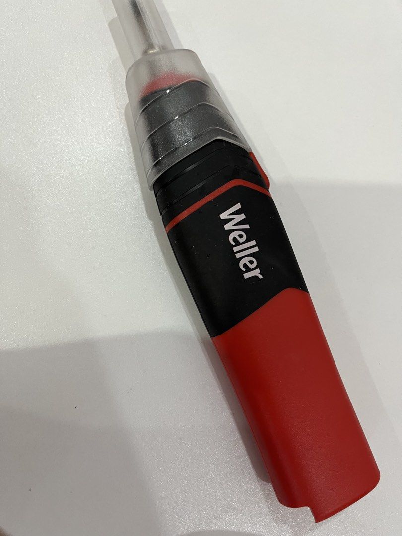 Weller Cordless Gas Soldering Iron (Category: Construction Tools & Equipment) located in Rizal. Submitted by oncelove143 (Listing ID 1471142604, Image 1). Description: - Brand/Model: Weller gas soldering iron - Color: Red and black body - Power Source: Butane gas (refillable via bottom port) - Condition: Soldering tip shows minor previous use residue - Extras: Includes clear protective cap for safe storage - Best For: Portable electronics work, D