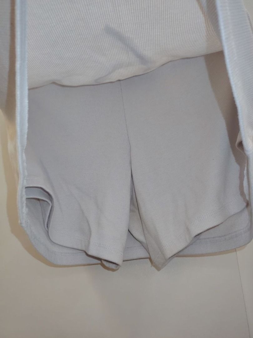 White Skort with Drawstring and Built-in Shorts (Category: Skirts) located in Manila. Submitted by babeboxtheory (Listing ID 1471169221, Image 2). Description: - Color: White - Fabric: Ribbed material - Waist: Adjustable drawstring for a custom fit - Comfort: Built-in inner shorts for safe and active movement - Style: Clean look, ideal for sports, workouts, or daily casual outings.