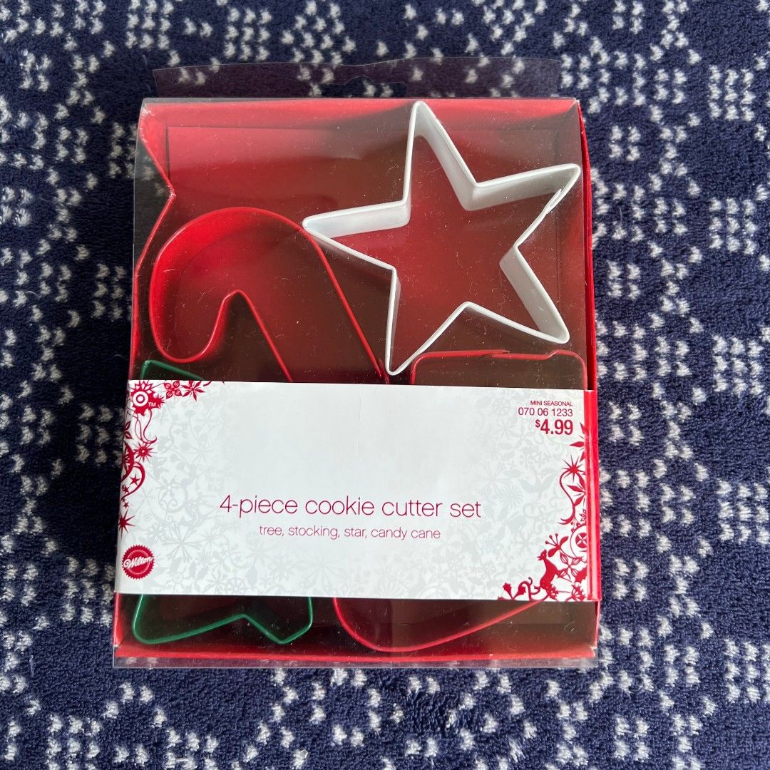 Wilton 4 Piece Holiday Cookie Cutter Set tree, stocking, star, candy cane (Category: Bakeware) located in Quezon City. Submitted by rosepam (Listing ID 1471158594, Image 1). Description: Wilton 4 Piece Holiday Cookie Cutter Set tree, stocking, star, candy cane FIX PRICE From the US Not used, stored lang (medyo dusty and dented box).