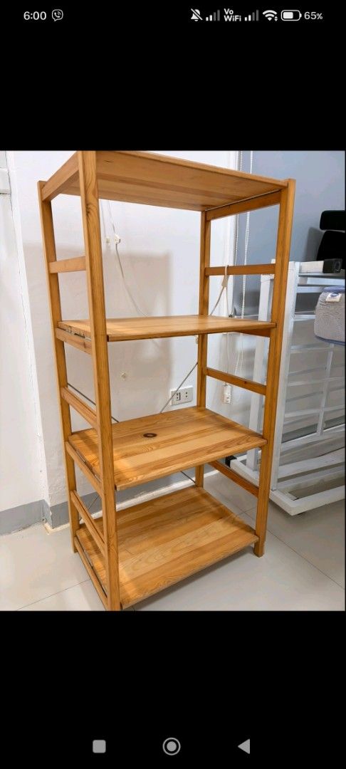Wooden 4-Tier Storage Shelving Unit (Category: Shelves, Cabinets & Racks) located in Pasay City. Submitted by enajm (Listing ID 1471221807, Image 1). Description: - Wooden storage rack with 4 spacious open shelves - Sturdy frame featuring diagonal metal bracing on the back for extra support - Natural wood finish with beautiful grain patterns - Solid construction ideal for books, plants, kitchen gear, or general items - Clean, minimalist look that