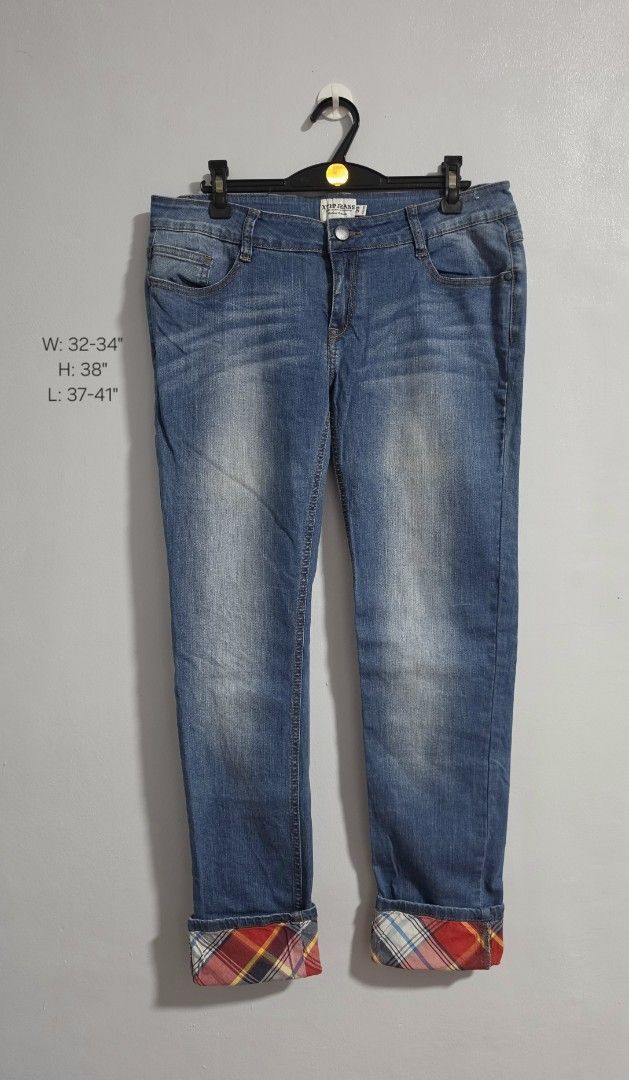 Xtep Jeans Denim Pants Blue Size 32-34 (Category: Jeans) located in Paranaque City. Submitted by franinnashop (Listing ID 1471132818, Image 1). Description: Declutter - Brand: Xtep Jeans - Wash: Classic blue - Fit: Mid-rise with front button closure, belt loops, and pockets - Unique Detail: Roll-up cuffs featuring a red and yellow plaid flannel lining - Measurements (Flat Lay): Waist 32-34 inches | Hips 38 inches | Length 37-41 inches - Condition