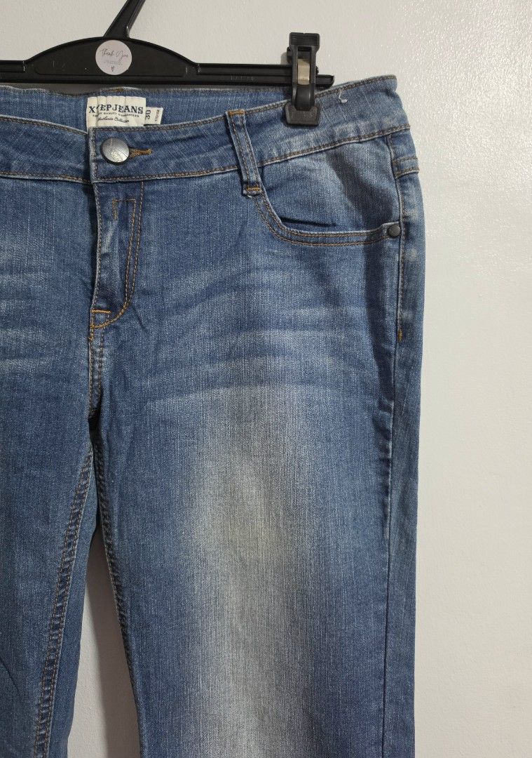 Xtep Jeans Denim Pants Blue Size 32-34 (Category: Jeans) located in Paranaque City. Submitted by franinnashop (Listing ID 1471132818, Image 3). Description: Declutter - Brand: Xtep Jeans - Wash: Classic blue - Fit: Mid-rise with front button closure, belt loops, and pockets - Unique Detail: Roll-up cuffs featuring a red and yellow plaid flannel lining - Measurements (Flat Lay): Waist 32-34 inches | Hips 38 inches | Length 37-41 inches - Condition