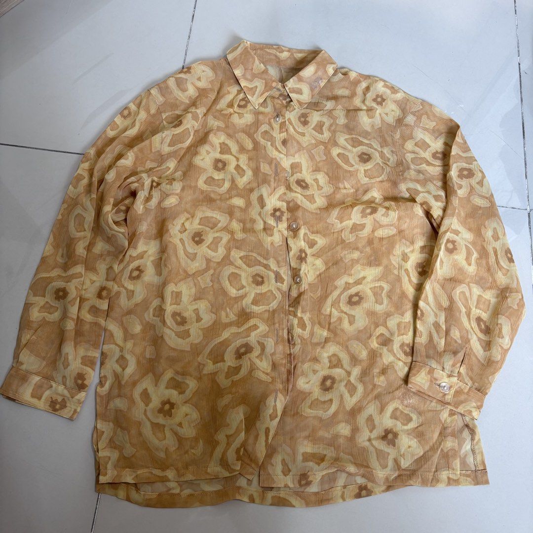 yellow floral sheer button up shirt (Category: Blouses) located in Quezon City. Submitted by yamakento (Listing ID 1471144965, Image 2). Description: fits s-m; with flaw (3rd pic).