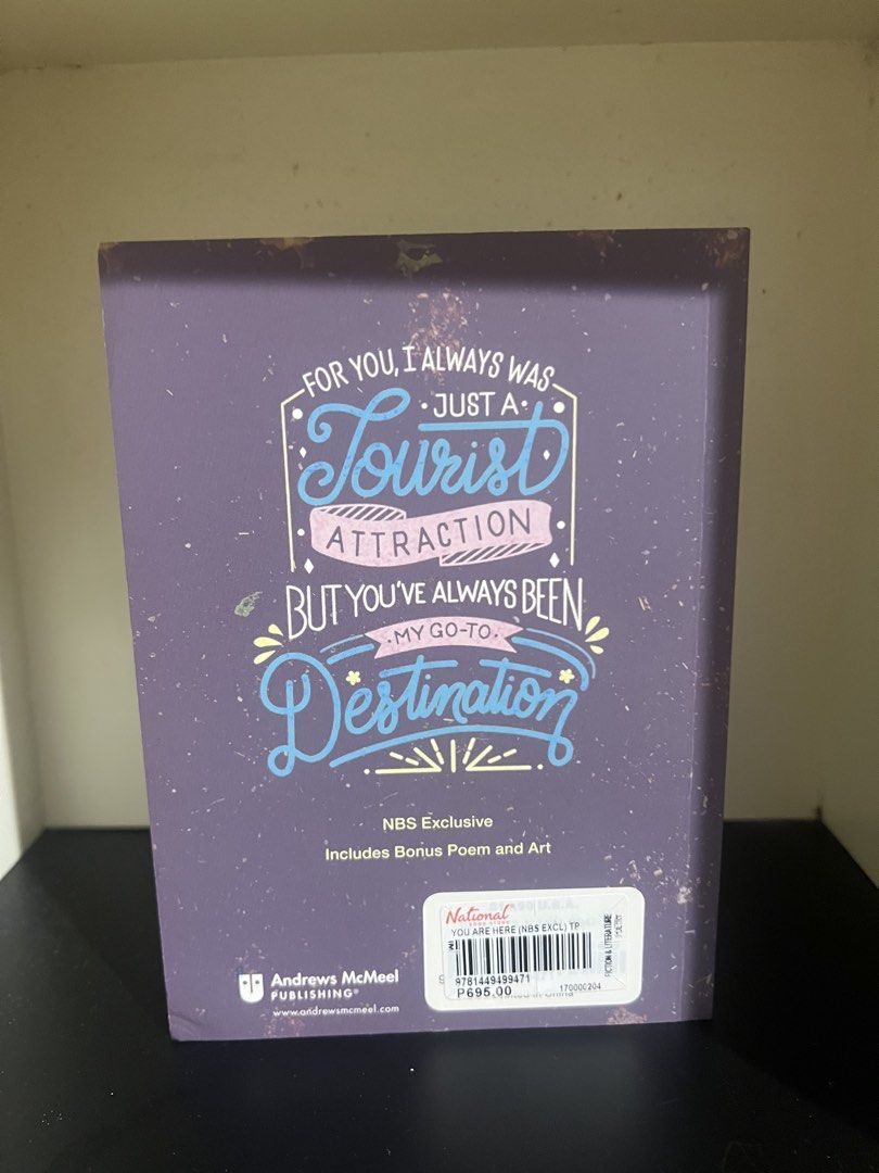 You Are Here by Dawn Lanuza (Category: Storybooks) located in Makati City. Submitted by foundbychance (Listing ID 1471238935, Image 2). Description: - Title: You Are Here by Dawn Lanuza - Publisher: Andrews McMeel Publishing - Edition: National Book Store (NBS) Exclusive - Features: Includes bonus poem and art - Design: Purple cover with colourful typography and sneaker illustration - Condition: Clean copy with original NBS price tag on the back.