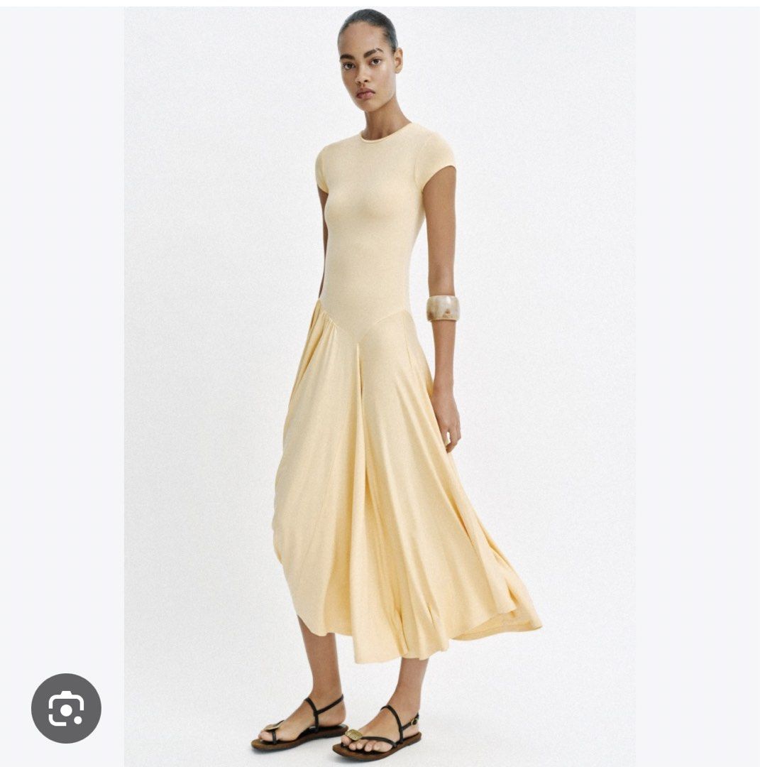 Zara Asymmetrical long dress (Category: Dresses) located in Valenzuela. Submitted by shielaaaa_preloved (Listing ID 1471131361, Image 2). Description: Zara Asymmetrical long dress Bnew Color light yellow Soft fabric, stretchy With washable stain.
