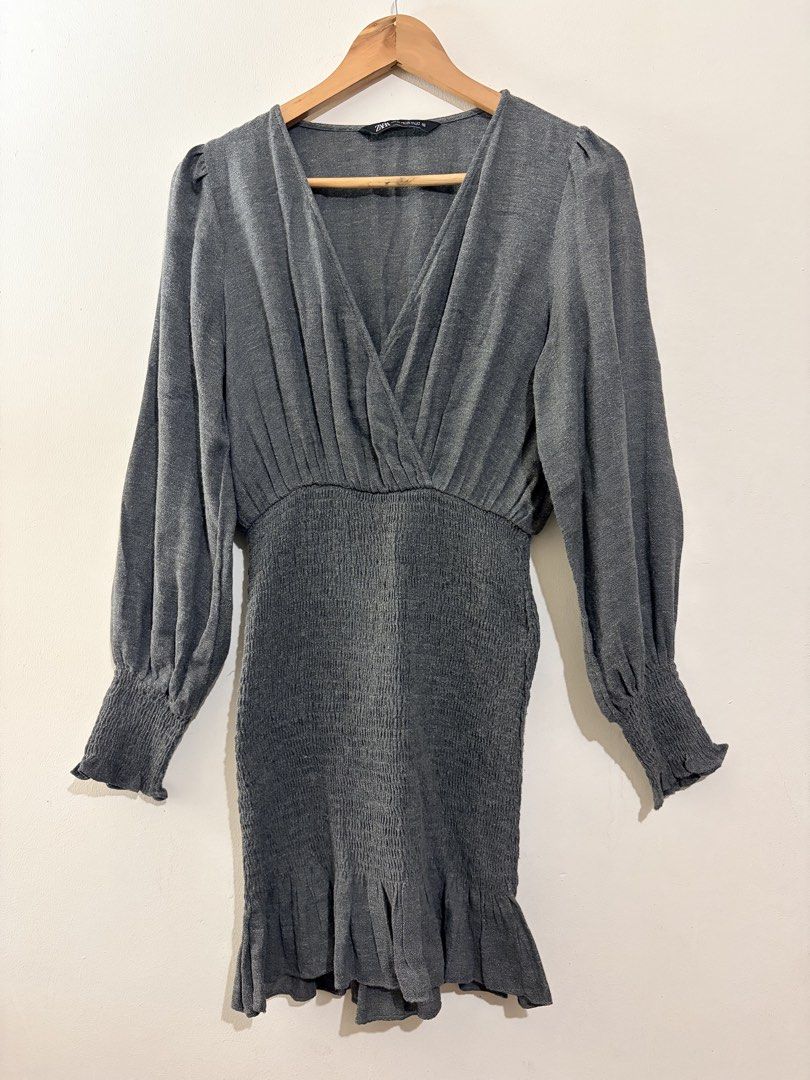 Zara Grey Smocked Wrap Mini Dress (Category: Dresses) located in Pasig City. Submitted by shopsmart.mnl (Listing ID 1471290638, Image 2). Description: Used twice Excellent condition No issues XS in tag fits up to M .
