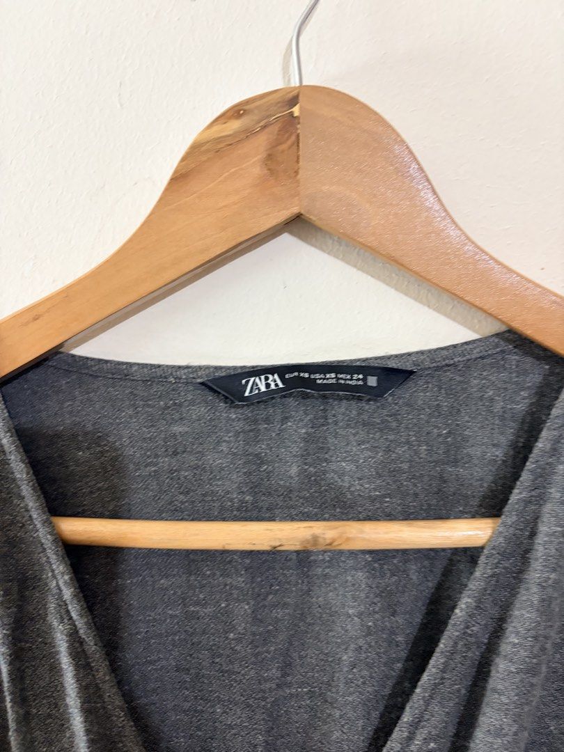 Zara Grey Smocked Wrap Mini Dress (Category: Dresses) located in Pasig City. Submitted by shopsmart.mnl (Listing ID 1471290638, Image 3). Description: Used twice Excellent condition No issues XS in tag fits up to M .