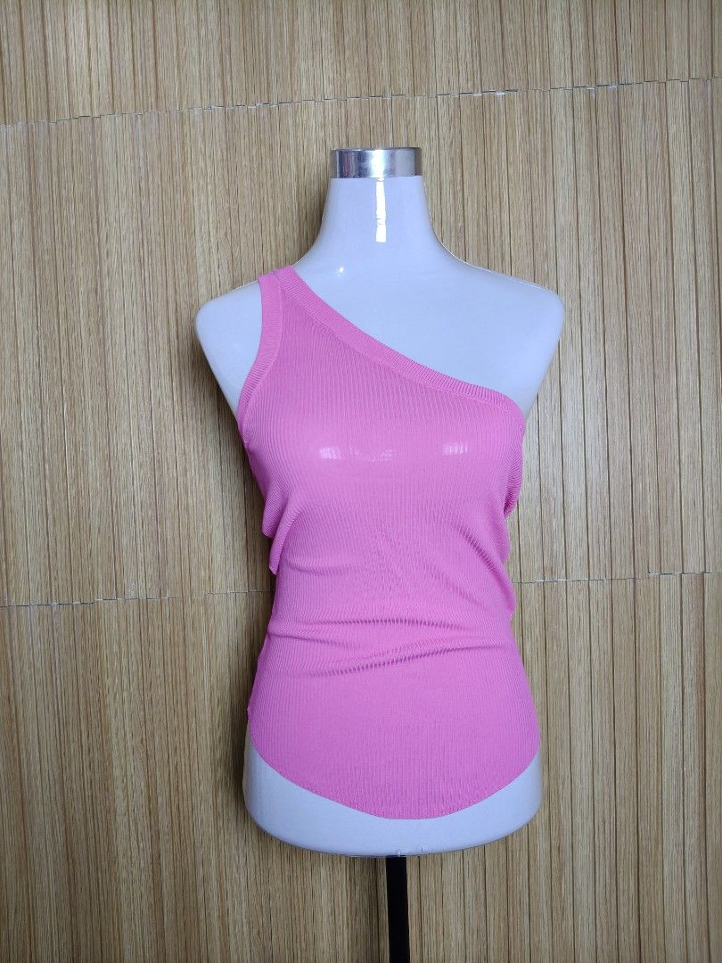 Zara Pink One-Shoulder Ribbed Tank Top (Category: Sleeveless) located in Taguig. Submitted by ashie_clothing (Listing ID 1471256875, Image 2). Description: - Brand: Zara - Size: L (Brand new with original price tag attached) - Color: Vibrant bright pink - Design: Chic one-shoulder neckline with a stretchy ribbed texture - Material: Super comfy and soft - Styling: Great basic piece to pair with high-waisted jeans or skirts.