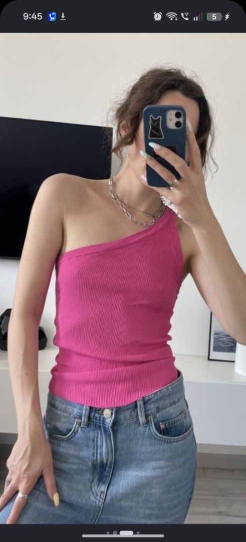 Zara Pink One-Shoulder Ribbed Tank Top (Category: Sleeveless) located in Taguig. Submitted by ashie_clothing (Listing ID 1471256875, Image 1). Description: - Brand: Zara - Size: L (Brand new with original price tag attached) - Color: Vibrant bright pink - Design: Chic one-shoulder neckline with a stretchy ribbed texture - Material: Super comfy and soft - Styling: Great basic piece to pair with high-waisted jeans or skirts.