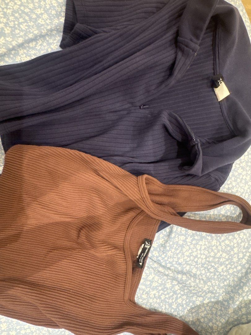 Zara Ribbed Tops Bundle Navy Brown (Category: Sleeveless) located in Quezon City. Submitted by puredragon_9f8b39 (Listing ID 1471274959, Image 1). Description: - Bundle includes 2 Zara ribbed tops - 1 dark navy blue collared top with zip neckline - 1 brown sleeveless top with thick straps - Super comfortable and stretchy fabric - Standard Zara sizing on tags.