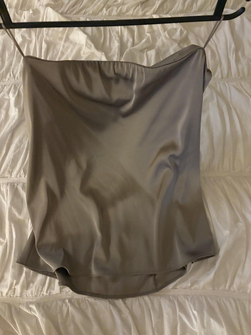 Zara Satin Camisole Top Size S (Category: Sleeveless) located in Makati City. Submitted by audrey.hepburn (Listing ID 1471148671, Image 2). Description: - Brand: Zara - Style: Satin camisole top with spaghetti straps, straight neckline, and slightly curved hem - Color: Taupe - Size: S (EUR/USA tag) - Condition: Brand new with tags attached, never worn - Material: Smooth fabric with a luxurious slight sheen.