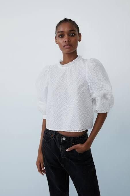 Zara White Voluminous Textured Puff-Sleeve Top (Category: Blouses) located in Pasig City. Submitted by shopsmart.mnl (Listing ID 1471285767, Image 1). Description: No issue and excellent condition XS in tag can fit up to S.