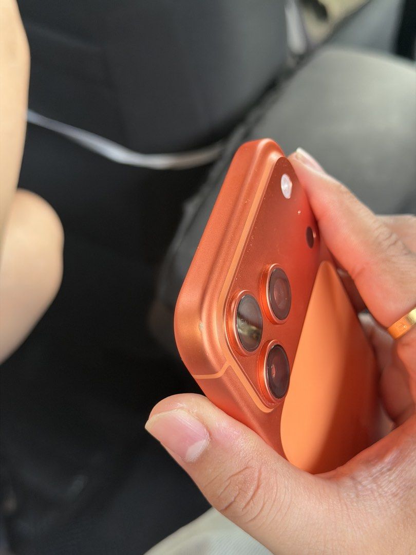 Apple iPhone 17 Pro Max Orange 256GB (Category: iPhone 17 Series) located in Manila. Submitted by nobodddyyy (Listing ID 1471308672, Image 3). Description: Iphone 17 promax 256gb Smartlocked Warranty until may 2027 batt health 100% Minimal dent on upper and lower Complete inclusion with free cases.