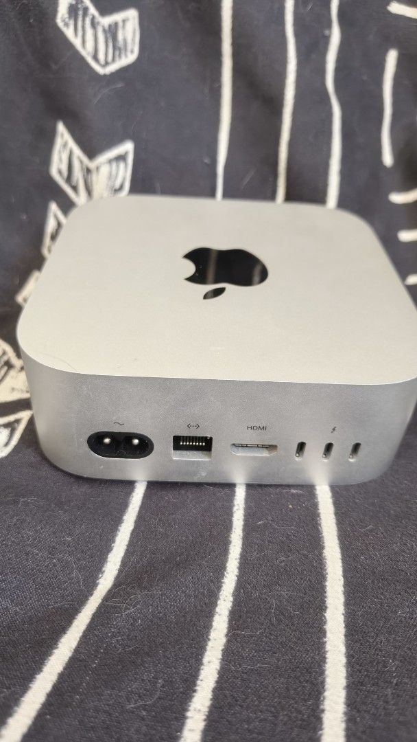 Apple Mac mini M4 24GB RAM 512GB SSD (Category: Desktops) located in Calamba. Submitted by handurawan3d (Listing ID 1471344919, Image 2). Description: - Model: Apple Mac mini with M4 chip - Memory & Storage: 24GB unified RAM and ~500GB storage - Design: Compact silver aluminum enclosure - Connectivity: Gigabit Ethernet, HDMI, and 3 Thunderbolt ports - OS: macOS (Fully functional, ready for desktop setup) issue? wala, plug and play, RFS need funds
