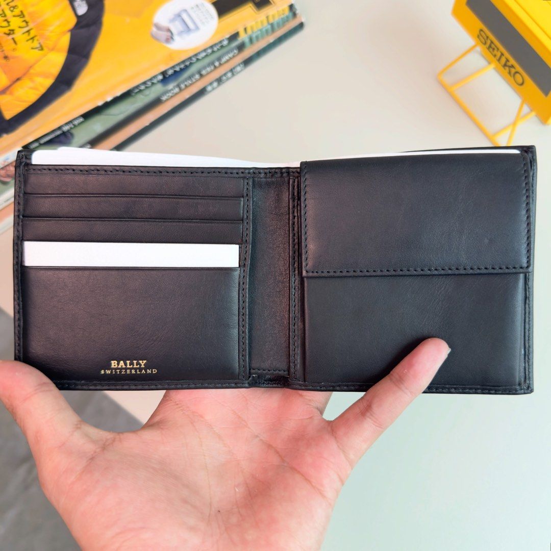 Bally Leather Bifold Wallet with Coin Pocket (Category: Wallets & Card Holders) located in San Isidro, Davao del Norte. Submitted by nikkody226_488 (Listing ID 1471319652, Image 3). Description: BALLY BIFOLD WALLET Black Webbing Calfskin Leather Price: 2,500 Condition: 9/10, well-maintained with minimal signs of use. Comes with original Bally card. Location: Three Groove Subdivision, Dungon, Iloilo Can also be shipped nationwide..