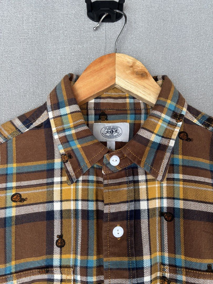 Bathing ape Baby milo plaid button up shirt (Category: Tshirts & Polo Shirts ) located in Manila. Submitted by austinace04 (Listing ID 1471310639, Image 3). Description: Prestine condition Size Large On Tag 22 x 28 Issue none Authentic .