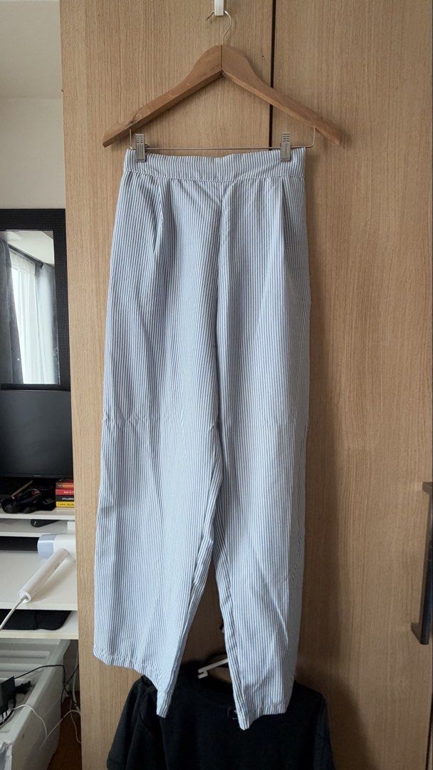 Blue and White Striped Vest and Pants Set (Category: Sets or Coordinates) located in Mandaluyong City. Submitted by andreyamari_ (Listing ID 1471307036, Image 3). Description: - Blue and white vertical stripe matching set - Vest features front buttons and two functional pockets - High-waisted pants with a clean, flattering waistband - Lightweight and breathable material - Easy to style together or mix and match with other pieces.