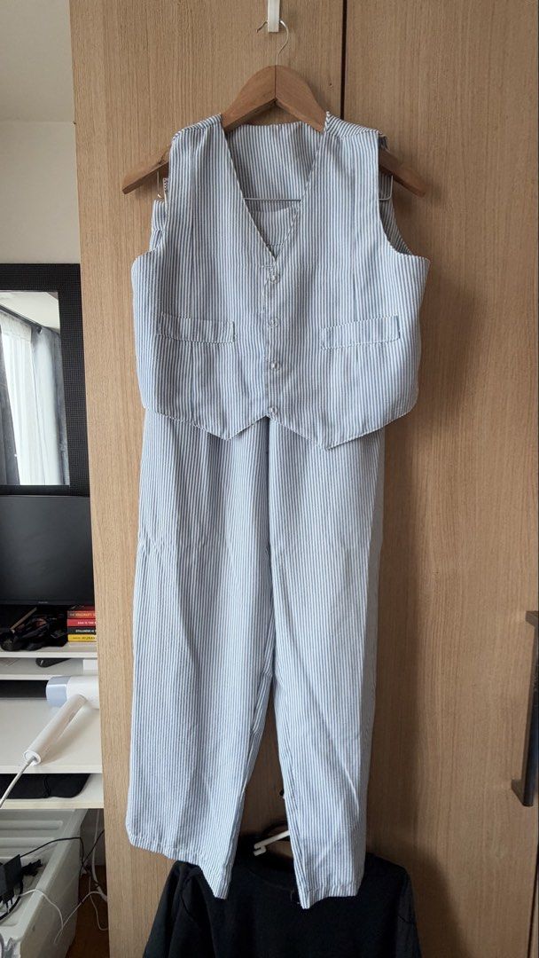 Blue and White Striped Vest and Pants Set (Category: Sets or Coordinates) located in Mandaluyong City. Submitted by andreyamari_ (Listing ID 1471307036, Image 1). Description: - Blue and white vertical stripe matching set - Vest features front buttons and two functional pockets - High-waisted pants with a clean, flattering waistband - Lightweight and breathable material - Easy to style together or mix and match with other pieces.