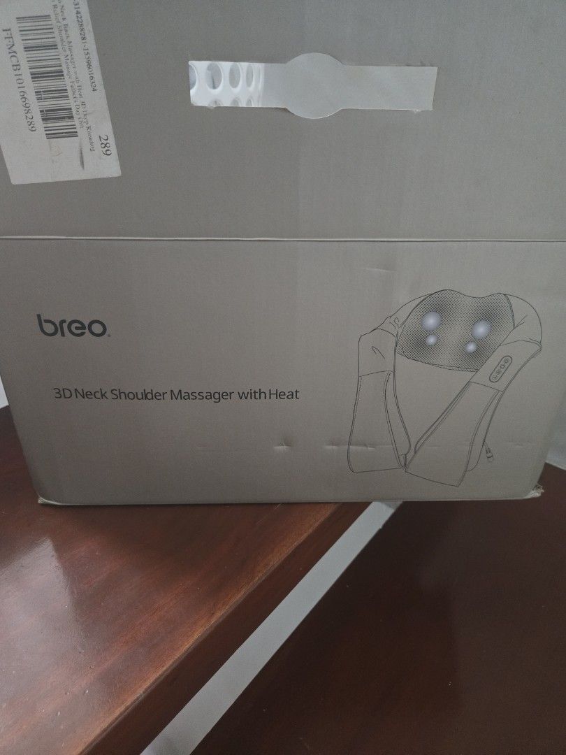 Breo 3D Neck Shoulder Massager with Heat (Category: Massage Devices) located in Pasig City. Submitted by izzy0202 (Listing ID 1471307052, Image 1). Description: - Brand: Breo - Condition: Brand new, unopened, and still sealed in original packaging - Features: 3D deep-kneading massage nodes with soothing heat function - Design: Integrated control buttons conveniently located on the strap - Perfect for: Relieving sore muscles in the neck and should