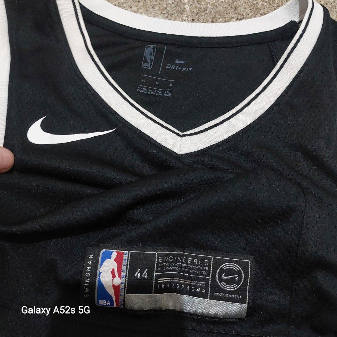 Brooklyn Nets Nike Swingman Jersey Size M (Category: Activewear) located in Manila. Submitted by hildafonac13322 (Listing ID 1471311119, Image 3). Description: - Team/Player: Brooklyn Nets, #12 - Brand/Tech: Nike Dri-FIT - Size: Medium (44) - Material: 100% recycled polyester (Made in Thailand) - Features: Swingman tag on bottom hem - Condition: Impeccable, clean inside and out.