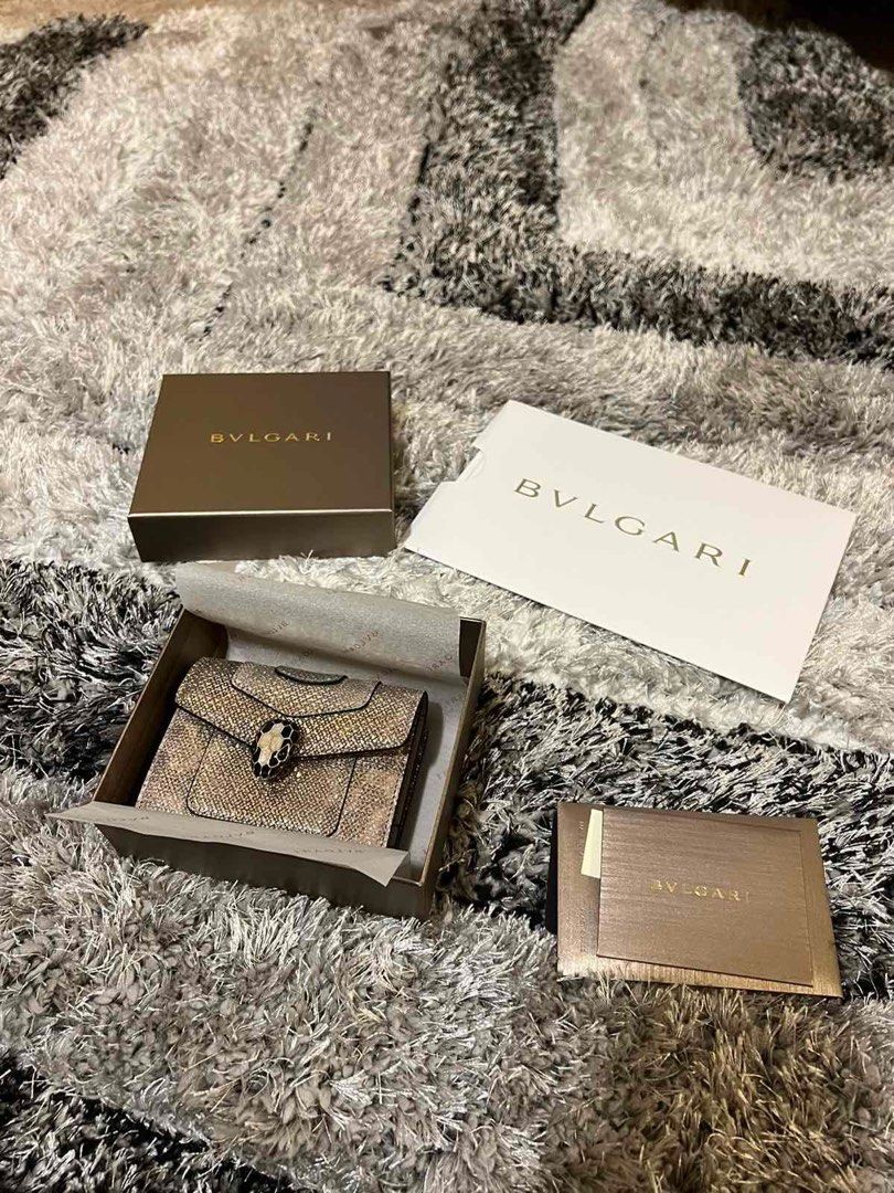 Bvlgari Serpenti Forever Metallic Wallet with Box (Category: Luxury Bags & Wallets) located in Subic. Submitted by jwevaultedfinds (Listing ID 1471355654, Image 1). Description: - Authentic Bvlgari Serpenti compact wallet - Eye-catching metallic finish with rich textured leather - Iconic snakehead closure accented with dark stones - Compact size designed to easily fit into mini bags - Includes original branded brown presentation box, dust paper, 
