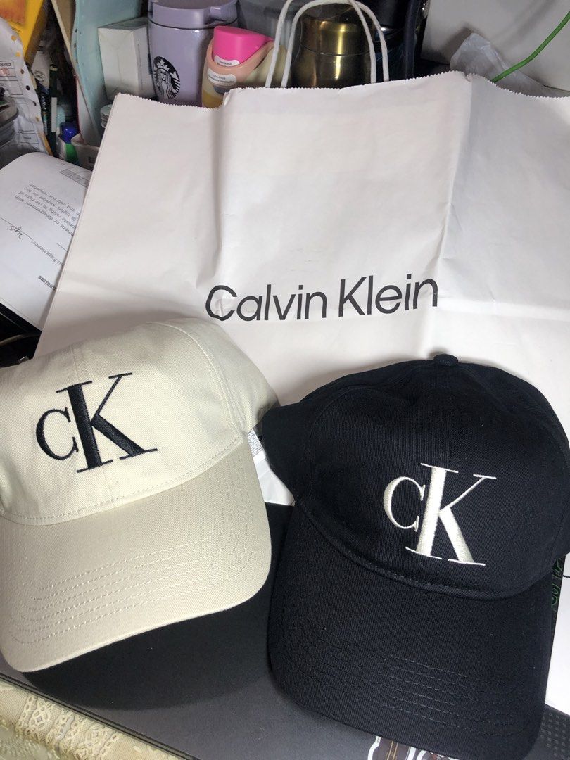 Calvin Klein cK Baseball Cap Hat Black Beige Set (Category: Caps & Hats) located in Caloocan City. Submitted by mannycoydegz8 (Listing ID 1471303134, Image 1). Description: - Includes Calvin Klein baseball caps (Black & Beige) - Bold embroidered cK logo on the front - Classic curved brim and adjustable back strap - Comes with original Calvin Klein paper bag - Versatile everyday style that matches any outfit ₱ 2200 each .