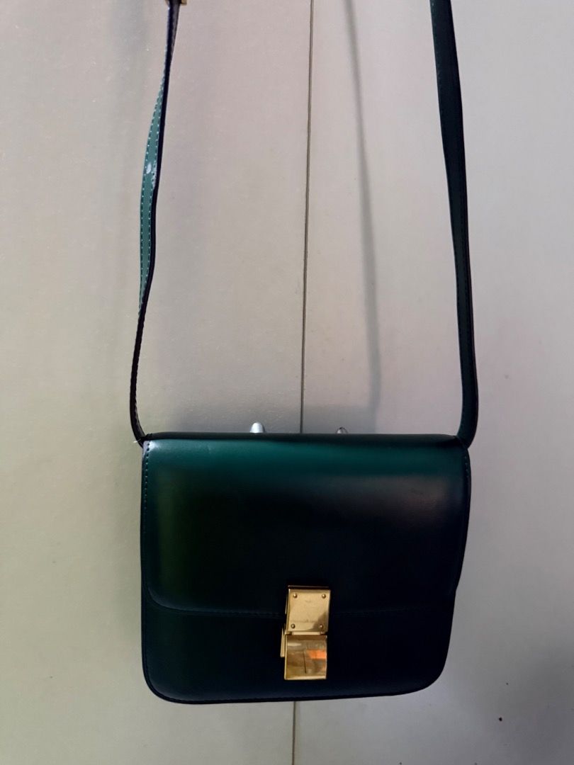 Celine Classic Box Bag Green Leather (Category: Luxury Bags & Wallets) located in Manila. Submitted by _outofthecloset. (Listing ID 1471318107, Image 1). Description: - Brand: Celine Classic Box Bag - Material: Premium smooth leather in a stunning dark green shade - Hardware: Elegant gold-tone closure with stamped Celine Paris logo - Interior: Multiple clean compartments lined with matching leather - Strap: Adjustable leather shoulder strap inclu