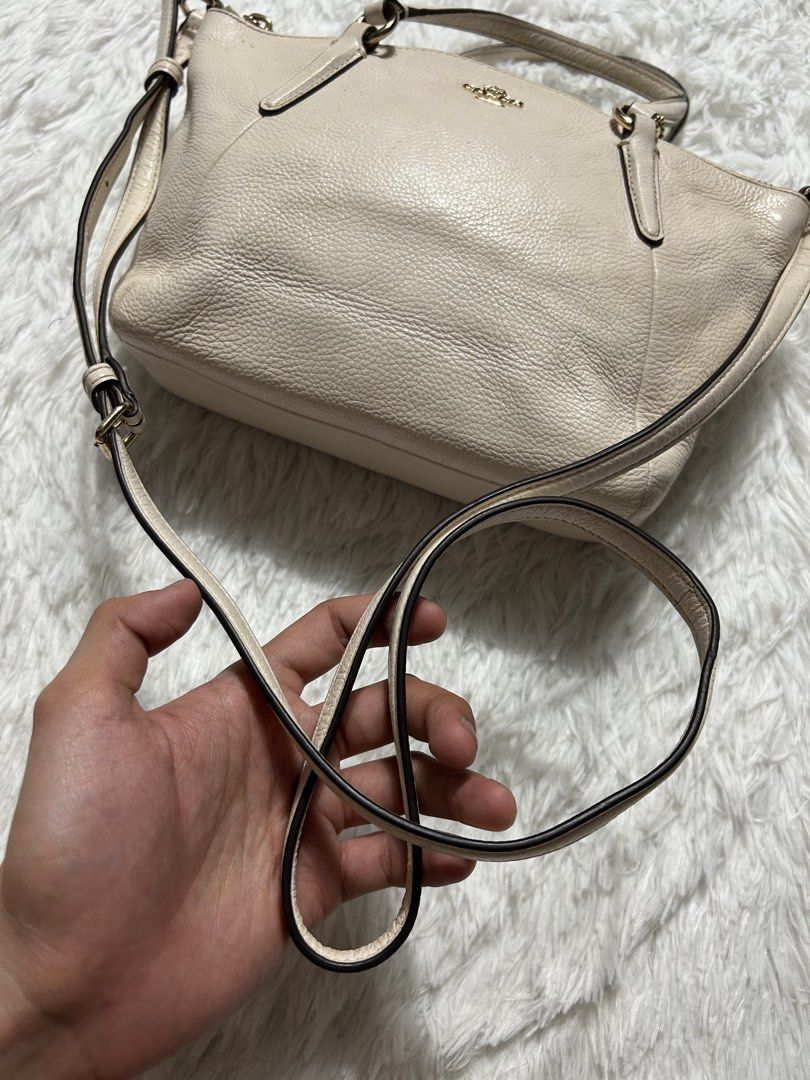 Coach Kelsey Satchel 2-way bag (Category: Luxury Bags & Wallets) located in Quezon City. Submitted by commonwealthpickerph (Listing ID 1471306124, Image 3). Description: Coach Kelsey Satchel 2-way bag 11 width // 7 length - Premium grainy texture leather exterior with gold-tone hardware - Dual top handles plus an adjustable/detachable shoulder strap for versatile wear - Secure zip-top closure to keep your essentials safe - Dark brown fabric-lined