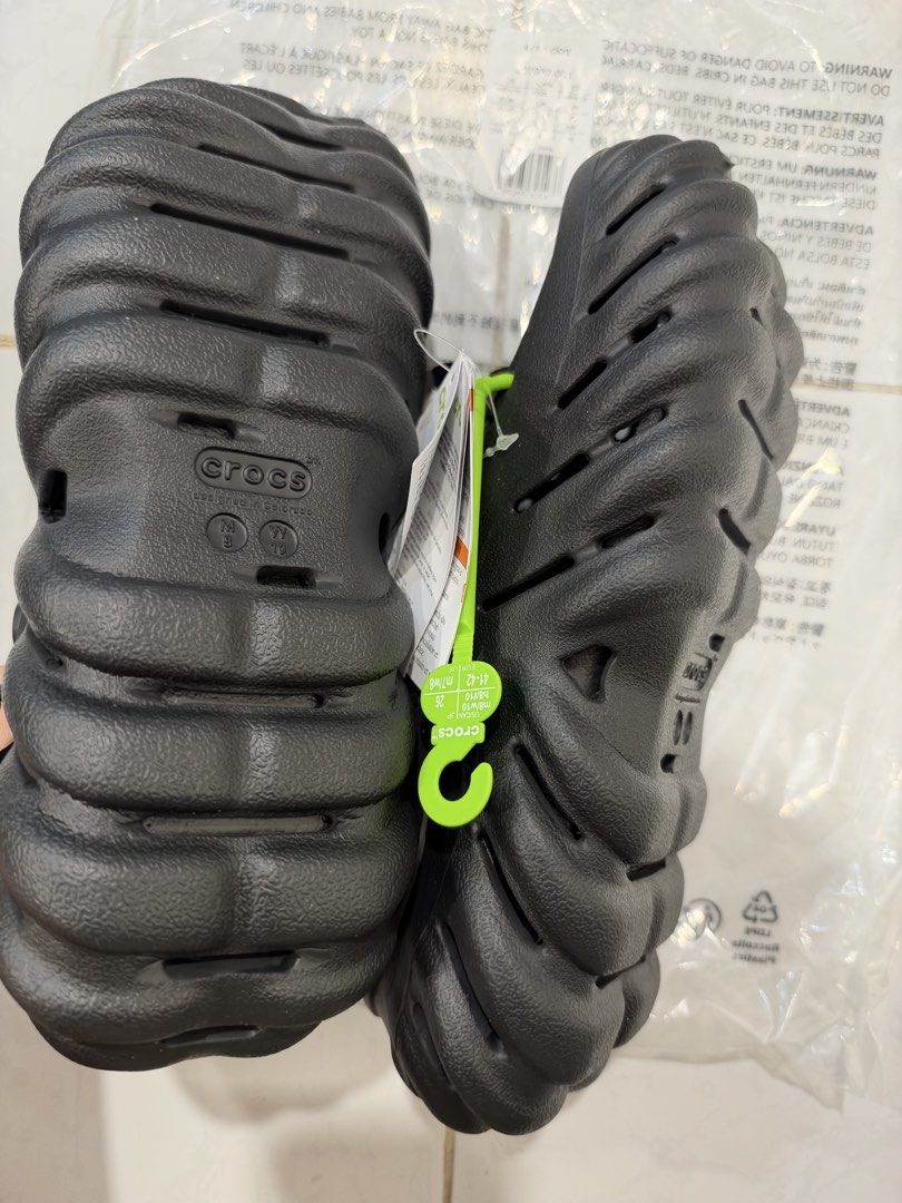 Crocs Echo Clog Black Size M8 W10 (Category: Slippers & Slides) located in Quezon City. Submitted by authenticprelovedbykate (Listing ID 1471358090, Image 3). Description: - Item: Crocs Echo Clogs - Color: Black - Size: Men 8 / Women 10 / EU 41-42 - Condition: Brand new with original tags and packaging bag - Features: Futuristic molded design, aggressive tread, adjustable heel strap, and roomy fit.