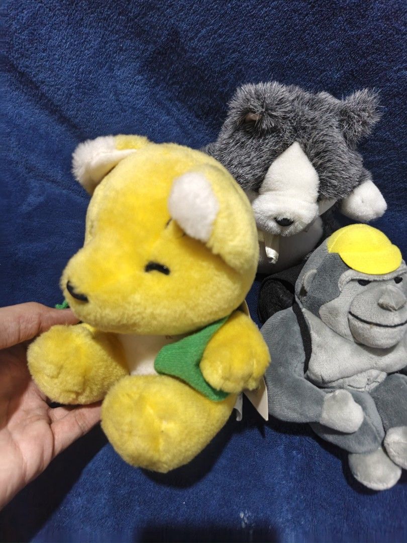 Cute Stuffed Animal Plush Toys Bundle Set (Category: Plushies & Soft Toys) located in Manila. Submitted by kirstentoyshub (Listing ID 1471334387, Image 2). Description: - Set of 3 adorable and cuddly plush toys - Includes: Yellow bear (in green clothes), fluffy grey & white cat (with yellow ribbon), and grey gorilla (with construction hat and backpack) - Made with ultra-soft materials - Perfect for plushie collectors or as a gift - Condition: Bra