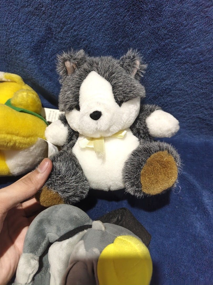 Cute Stuffed Animal Plush Toys Bundle Set (Category: Plushies & Soft Toys) located in Manila. Submitted by kirstentoyshub (Listing ID 1471334387, Image 3). Description: - Set of 3 adorable and cuddly plush toys - Includes: Yellow bear (in green clothes), fluffy grey & white cat (with yellow ribbon), and grey gorilla (with construction hat and backpack) - Made with ultra-soft materials - Perfect for plushie collectors or as a gift - Condition: Bra
