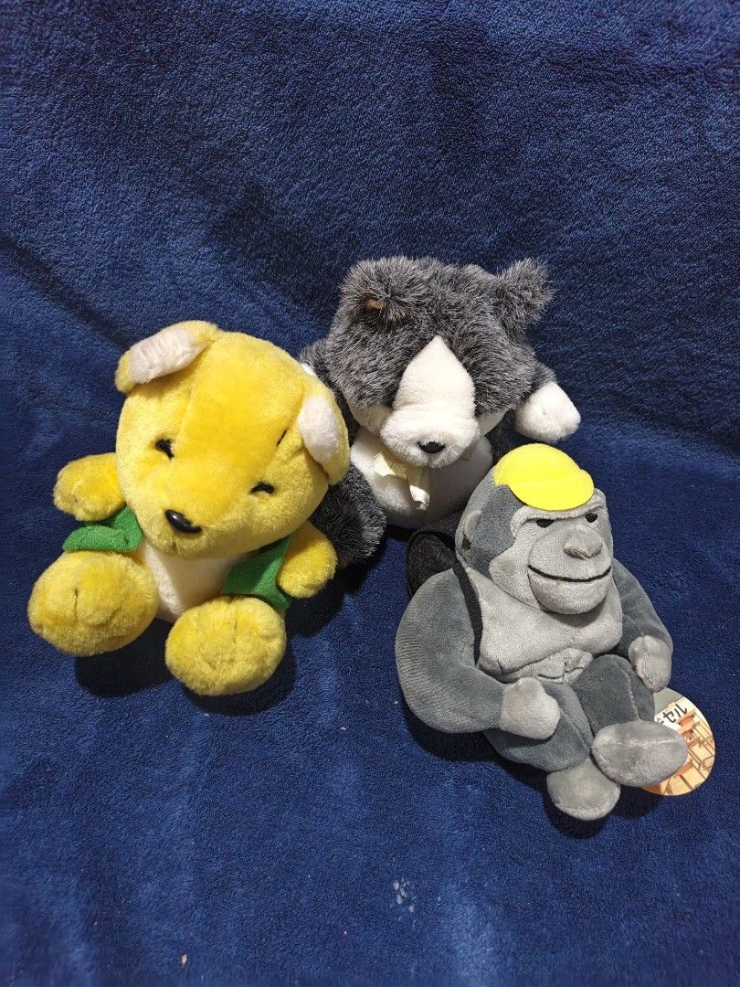 Cute Stuffed Animal Plush Toys Bundle Set (Category: Plushies & Soft Toys) located in Manila. Submitted by kirstentoyshub (Listing ID 1471334387, Image 1). Description: - Set of 3 adorable and cuddly plush toys - Includes: Yellow bear (in green clothes), fluffy grey & white cat (with yellow ribbon), and grey gorilla (with construction hat and backpack) - Made with ultra-soft materials - Perfect for plushie collectors or as a gift - Condition: Bra