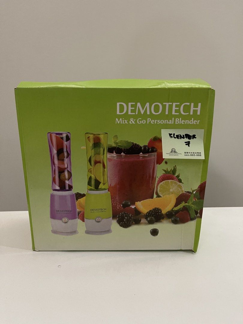 Demotech Mix & Go Personal Blender (Category: Juicers, Blenders & Grinders) located in Quezon City. Submitted by bravehorse_f1f6d5 (Listing ID 1471368319, Image 1). Description: - Brand: Demotech Mix and Go personal blender - Condition: Brand new, unopened in original box - Color/Design: Green box packaging featuring purple and green blenders with fresh fruits - Use: Quick and easy smoothie and juice maker for everyday mornings - Reason for selli