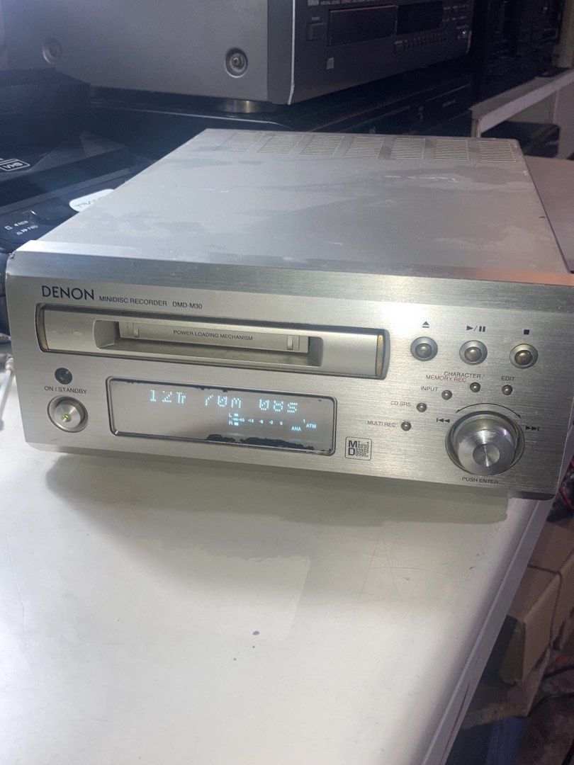 DENON DMD-M30 Minidisc Player and Recorder MD (Category: Soundbars, Speakers & Amplifiers) located in Manila. Submitted by musika_pilipinas (Listing ID 1471331343, Image 2). Description: DENON DMD-M30 Minidisc Player and Recorder MD - Tested on playback and recording - Me slight na itim sa diplay, pero di naman kumakalat or lumalake - 110 volts ( need transformer ) - Pwede i test to sawa - Location Taguig - Asking Price 3,500 .
