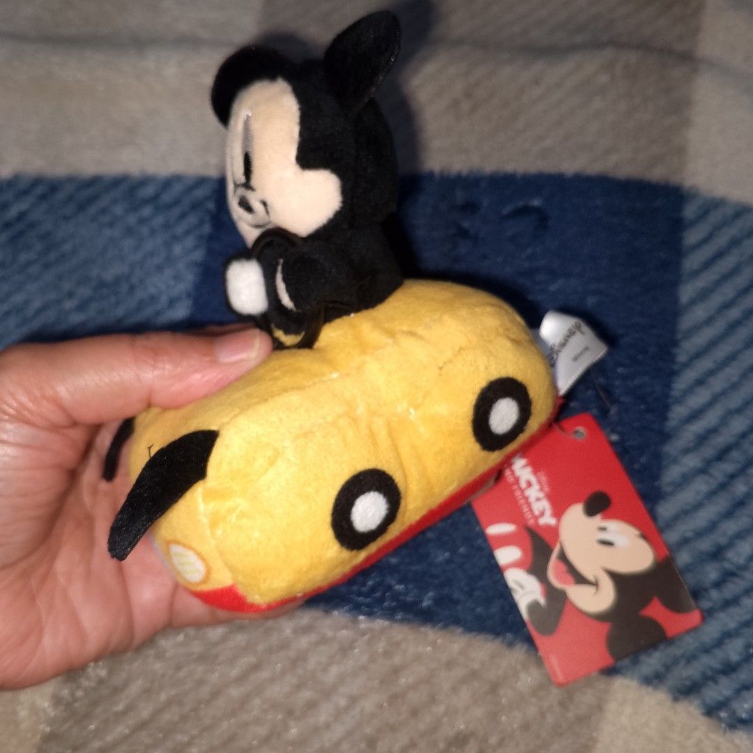 Disney Mickey Mouse Pull-Back Car Plush Toy (Category: Plushies & Soft Toys) located in Baguio. Submitted by kawaiikorner09 (Listing ID 1471309171, Image 2). Description: - Adorable Mickey Mouse plush toy sitting inside a bright yellow and red car - Features a classic black and white Mickey design made with soft, huggable fabric - Equipped with pull-back friction wheels for fun, no-battery-needed racing action - Brand new with original tag attach