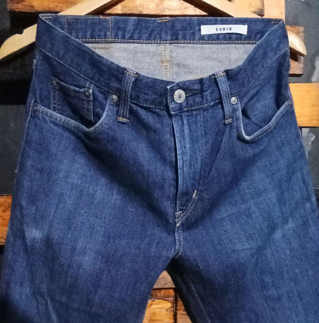 Edwin Denim Jeans Blue (Category: Jeans) located in Manila. Submitted by fastdragon_62f8c6 (Listing ID 1471309906, Image 3). Description: - Brand: Edwin - Color: Dark blue wash with great fading - Style: Classic five-pocket design with button fly - Details: Leather patch on back waistband and branded tab on back pocket - Measurements (Tape measured): Waist 32", Length 37", Hem 6.5" - Material: Sturdy, high-quality denim - Condition: Excellent pre