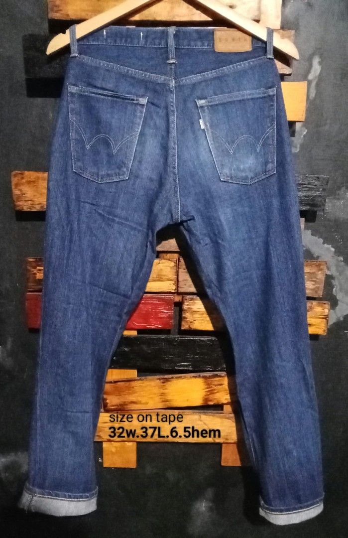 Edwin Denim Jeans Blue (Category: Jeans) located in Manila. Submitted by fastdragon_62f8c6 (Listing ID 1471309906, Image 2). Description: - Brand: Edwin - Color: Dark blue wash with great fading - Style: Classic five-pocket design with button fly - Details: Leather patch on back waistband and branded tab on back pocket - Measurements (Tape measured): Waist 32", Length 37", Hem 6.5" - Material: Sturdy, high-quality denim - Condition: Excellent pre