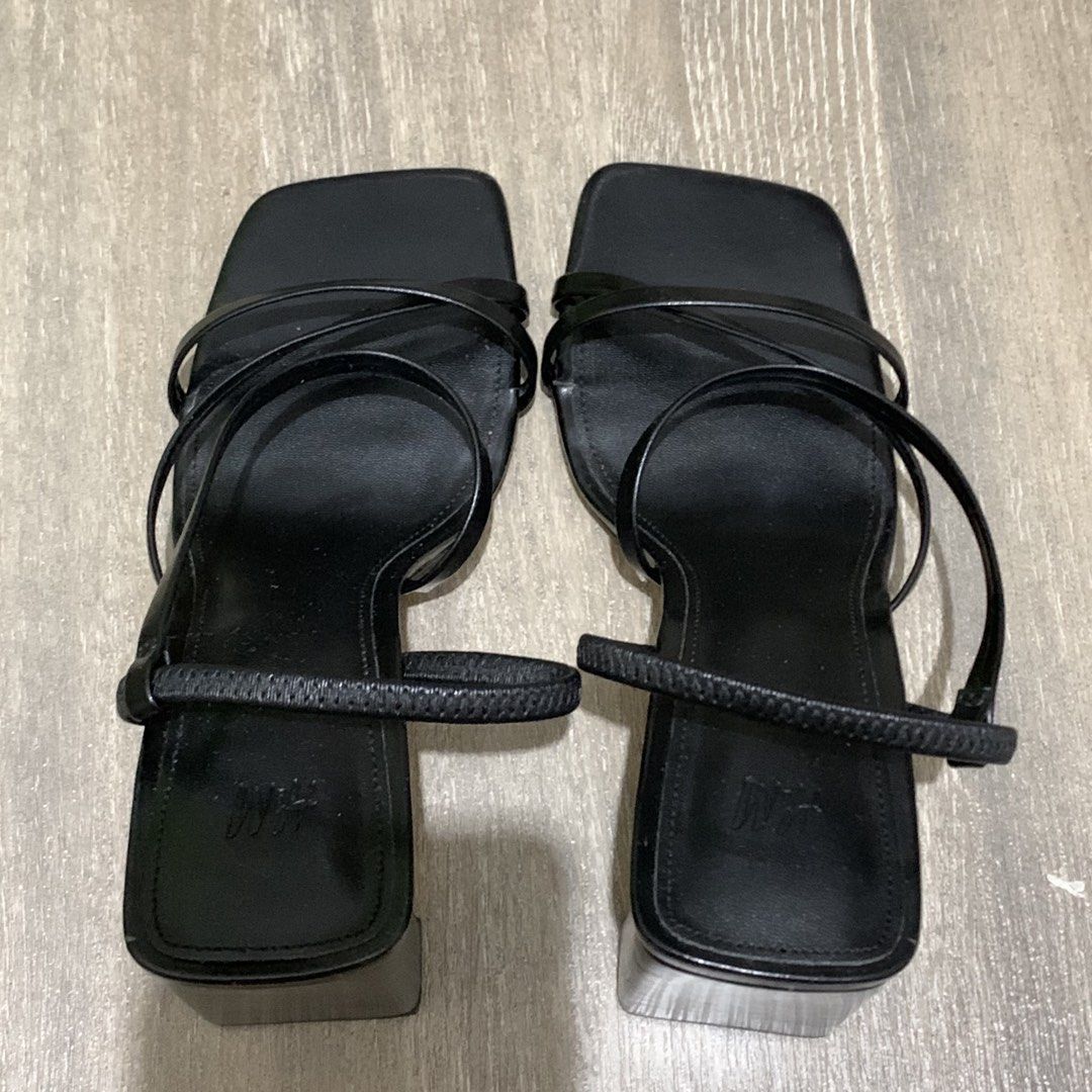 H&M Black Strappy Heeled Sandals (Category: Heels) located in Quezon City. Submitted by itscxyy (Listing ID 1471356233, Image 3). Description: - Brand: H&M - Style: Black strappy heels with square toe and ankle strap - Heel: Chunky block heel for great stability - Condition: Worn 1-2x, super clean soles and insoles with minimal wear - Best for: Parties, events, and night outs.