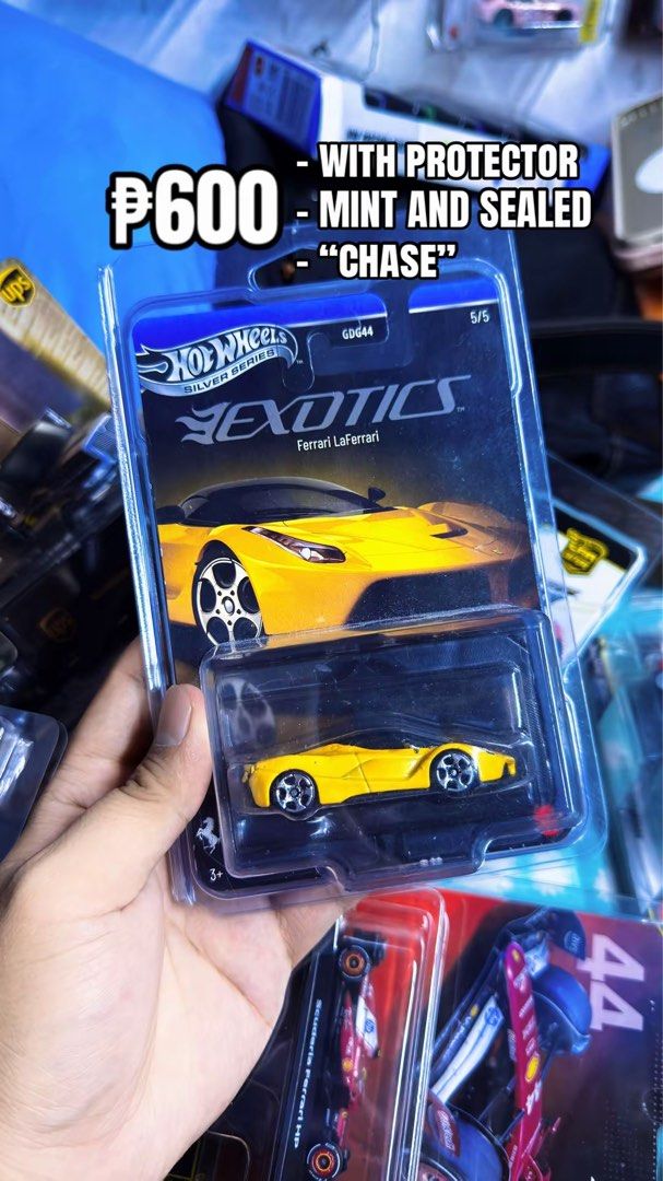 Hot Wheels Silver Series Exotics Ferrari LaFerrari (Category: Vehicle & Diecast Models) located in Quezon City. Submitted by huntwithnyx (Listing ID 1471298688, Image 1). Description: - Brand: Hot Wheels - Series: Silver Series Exotics (5 of 5) - Model: Ferrari LaFerrari (GDG44) - Color: Yellow exterior with black top - Variant: Rare Chase piece - Condition: Mint and sealed - Extra: Comes inside a protective case.